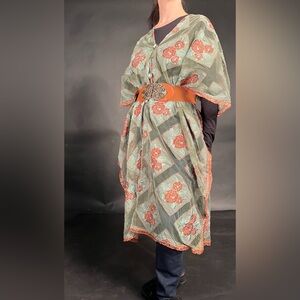 Tunic with cinch belt.